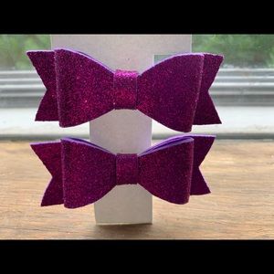 Pair of purple hair bows